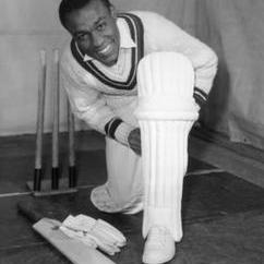 This 1963 photo shows Conrad Hunte padding up for some batting practice at Alf Glover's Cricket School in London © Getty Images